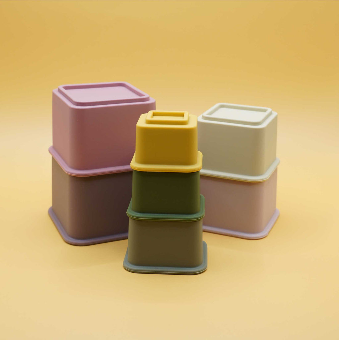 vibrant square silicone stacking cups separated apart
