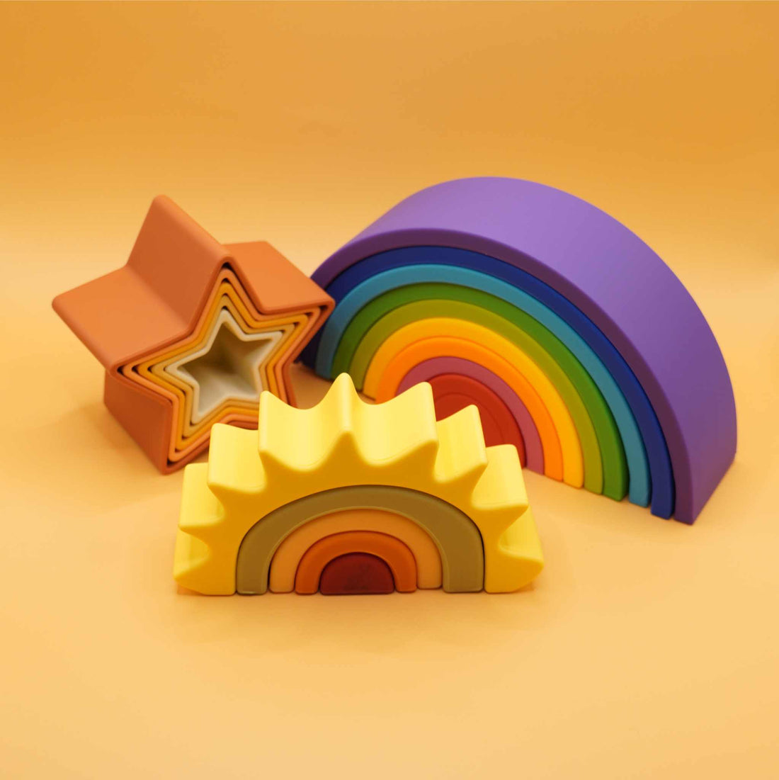 celestial wonders silicone stacking toy set with star, rainbow, and sun
