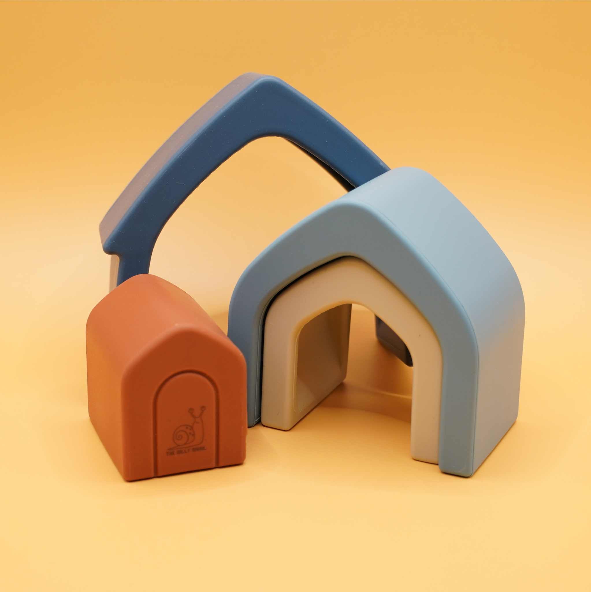 Home shaped silicone stacking toy with pieces separated