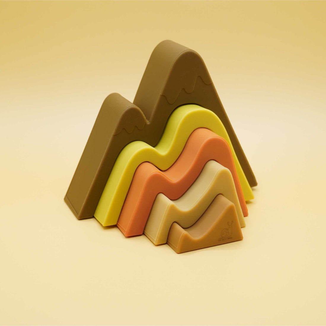 pieces spread apart of summer color mountain shaped stacking toy